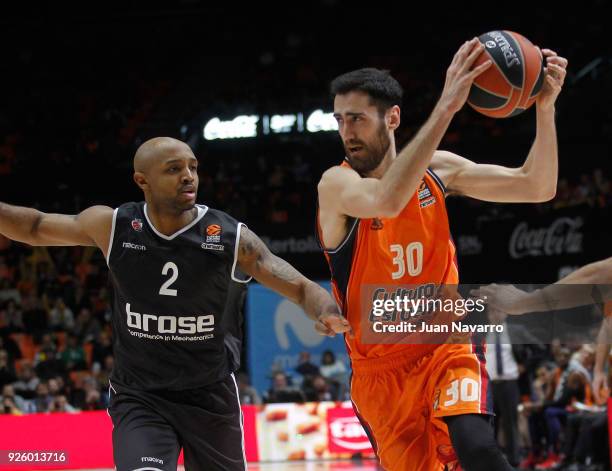 Joan Sastre, #30 of Valencia Basket competes with Ricky Hickman, #2 of Brose Bamberg during the 2017/2018 Turkish Airlines EuroLeague Regular Season...