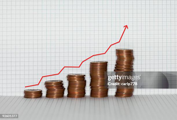 coins of graph paper - inflation stock pictures, royalty-free photos & images