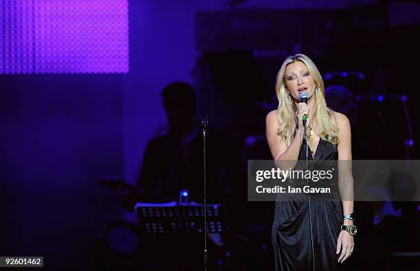 Caprice appears on stage as part of the PINKTOBER Women Of Rock Charity Concert at the Royal Albert Hall on November 1, 2009 in London, England.