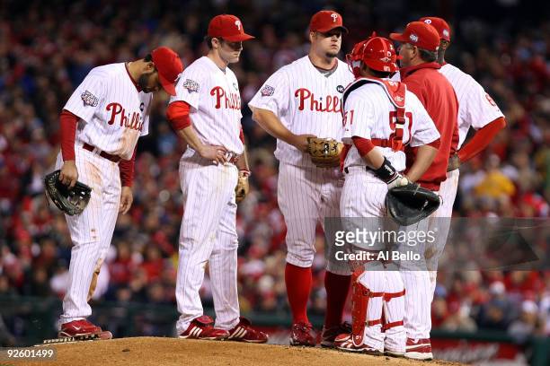 Pitching coach Rich Dubee of the Philadelphia Phillies comes out tot he mound to talk with Pedro Feliz, Chase Utley, Joe Blanton, Carlos Ruiz against...