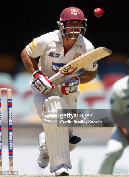 Chris Hartley of the Bulls keeps his eye on the ball during day two of the Sheffield Shield match between the Queensland Bulls and the Tasmanian...
