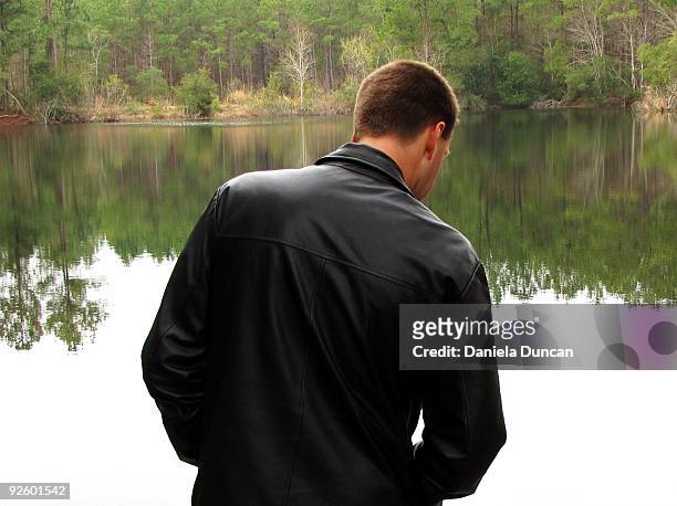 man wearing leather jacket - back of leather jacket stock pictures, royalty-free photos & images
