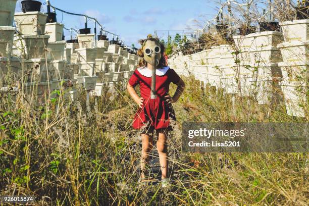 dystopia - gas mask stock pictures, royalty-free photos & images