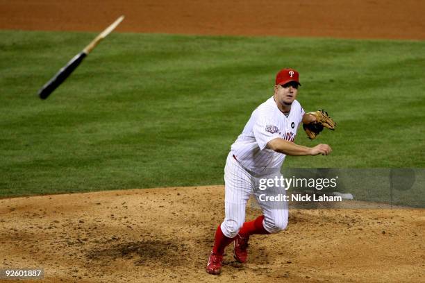 Joe Blanton of the Philadelphia Phillies watches the flight of the broken bat of Melky Cabrera of the New York Yankees in the top of the sixth inning...