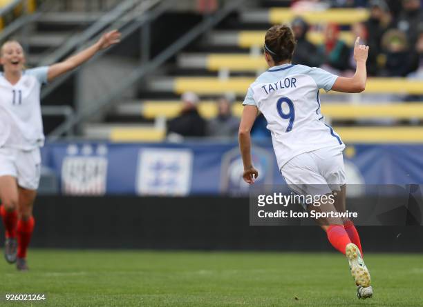 England forward Jodie Taylor celebrates after making a goal during the first half of the international game between England and France women's...