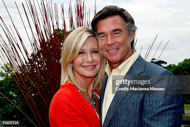 Olivia Newton-John and her husband John Easterling pose after participating in the Emirates Melbourne Cup Parade in Federation Square on November 2,...