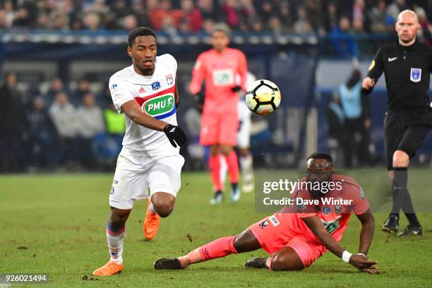 Myziane Maolida of Lyon and Tiemoko Ismael Diomande of Caen during the French Cup match between Caen and Lyon at Stade Michel D'Ornano on March 1,...