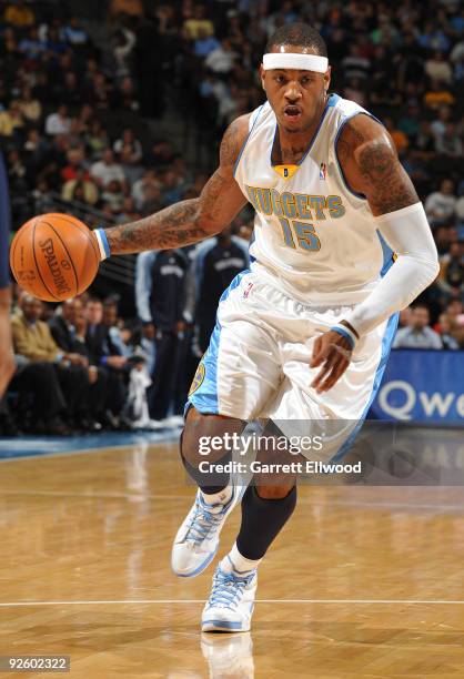 Carmelo Anthony of the Denver Nuggets goes to the basket against the Memphis Grizzlies on November 1, 2009 at the Pepsi Center in Denver, Colorado....