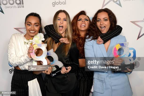 Leigh-Anne Pinnock, Perrie Edwards, Jesy Nelson and Jade Thirlwall of Little Mix win at The Global Awards 2018 at Eventim Apollo, Hammersmith on...
