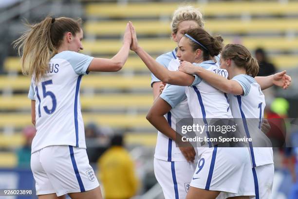 England forward Jodie Taylor celebrates after making a goal during the first half of the international game between England and France women's...