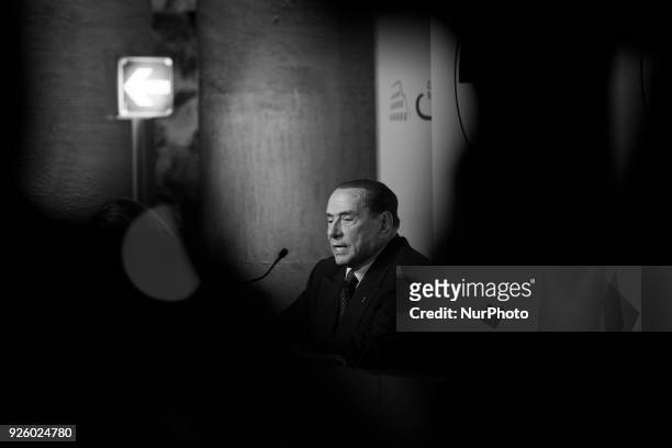 Image has been converted to black and white: Head of the centre-right Forza Italia Silvio Berlusconi gives a joint press conference with Leader of...