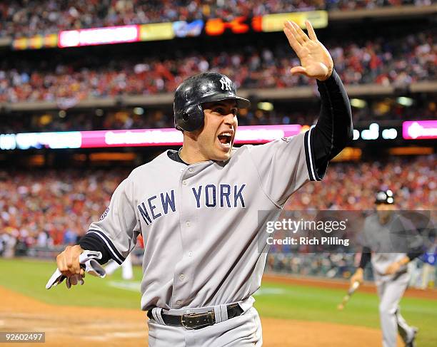 Mark Teixeira of the New York Yankees celebrates after scoring a run in the top of the ninth inning of Game Four of the 2009 MLB World Series at...