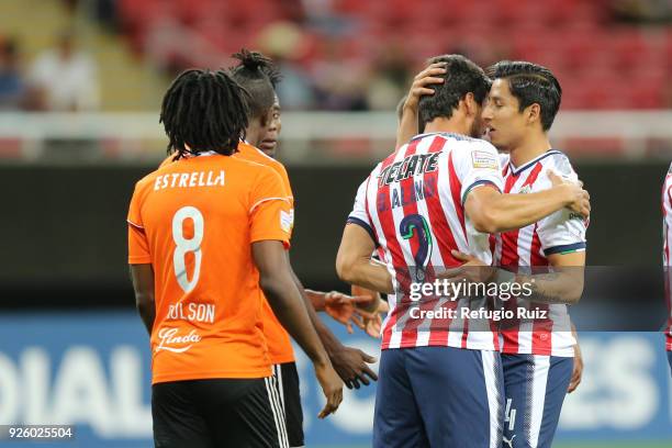 Oswaldo Alanis of Chivas celebrates with his teammates after scoring the first goal of his team during the match between Chivas and Cibao as part of...