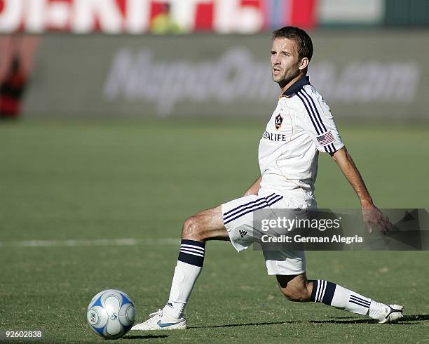 Mike Magee of the Los Angeles attacks the Chivas USA defensive line during Game One of the MLS Western Conference Semifinals at The Home Depot Center...