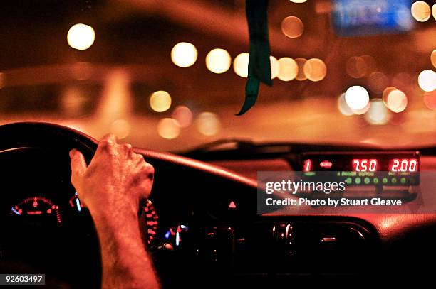taxi cab ride at night - taxi españa stockfoto's en -beelden