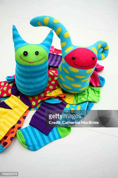 little sock monsters - catherine macbride stock pictures, royalty-free photos & images