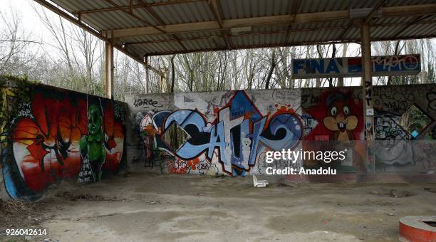 Deserted house painted with graffiti is seen in Doel Village of Antwerp, Belgium on February 1, 2018.