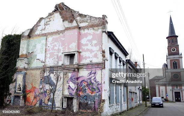 Deserted house painted with graffiti is seen in Doel Village of Antwerp, Belgium on February 1, 2018.