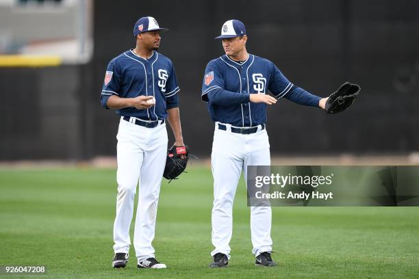 Luis Perdomo talks with Trevor Hoffman of the San Diego Padres during a workout at the Peoria Sports Complex on February 21, 2018 in Peoria, Arizona.