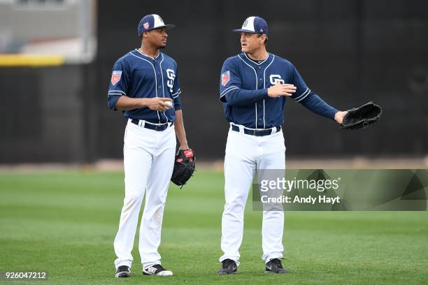 Luis Perdomo talks with Trevor Hoffman of the San Diego Padres during a workout at the Peoria Sports Complex on February 21, 2018 in Peoria, Arizona.
