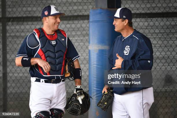 Ellis taks with Trevor Hoffman of the San Diego Padres during a workout at the Peoria Sports Complex on February 21, 2018 in Peoria, Arizona.