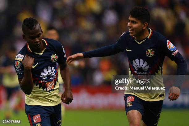 Darwin Quintero and Carlos Vargas of America celebrate their team first goal during the match between America and Saprissa as part of the round of...