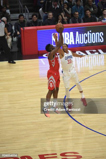 James Harden of the Houston Rockets shoots the ball over Wesley Johnson of the LA Clippers during the game on February 28, 2018 at STAPLES Center in...