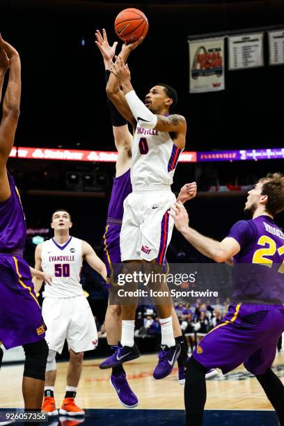 Evansville Aces guard Ryan Taylor goes up for a shot during the first half of an MVC Tournament basketball game between the Evansville Aces and the...