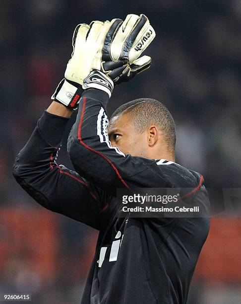 Nelson Dida of AC Milan cheers his fans during the Serie A match between AC Milan and Parma FC at Stadio Giuseppe Meazza on October 31, 2009 in...
