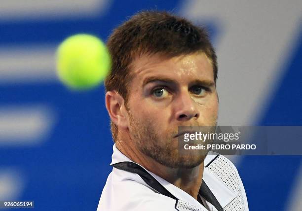Tennis player Ryan Harrison returns the ball to Germany's Alexander Zverev , during their Mexico ATP 500 Open men's single tennis match in Acapulco,...