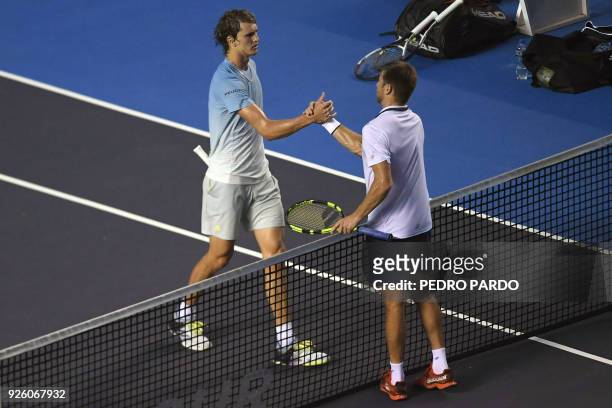 German tennis player Alexander Zverev shakes hands with US player Ryan Harrison after beating him during their Mexico ATP 500 Open men's single...
