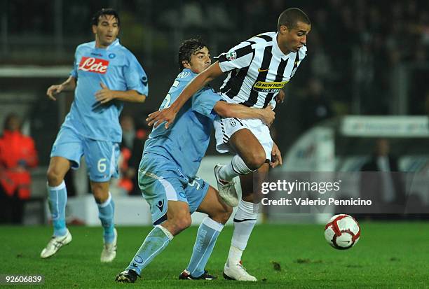 David Trezeguet of Juventus FC is challenged by Matteo Contini of SSC Napoli during the Serie A match between Juventus FC and SSC Napoli at Olimpico...