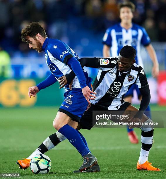 Jefferson Lerma of Levante UD duels for the ball with Ibai Gomez of Deportivo Alaves during the La Liga match between Deportivo Alaves and Levante UD...