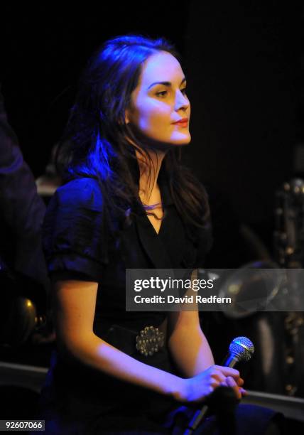 Michelle Dockery performs on stage with the Ronnie Scotts Big Band to celebrate 50 years of the legendary jazz club at Ronnie Scott's Jazz Club on...