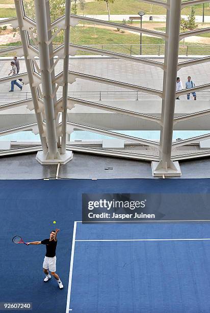 Andy Murray of Great Britain serves the ball during a training session on day one of the ATP 500 World Tour Valencia Open tennis tournament at the...