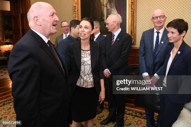 Australia's Governor-General Sir Peter Cosgrove talks to New Zealand's Prime Minister Jacinda Ardern during Ardern's official visit to Admiralty...