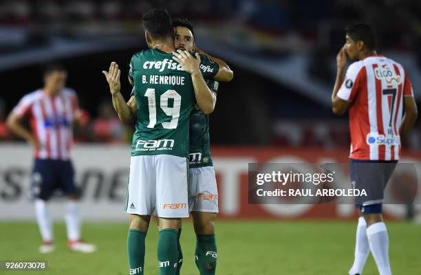 Brazil's Palmeiras player Bruno Henrique celebrates with a teammate his goal against Colombias Atletico Junior during their Copa Libertadores...