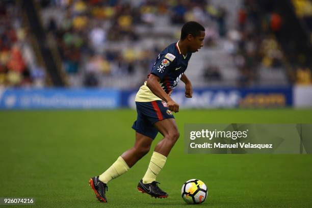 Andres Ibarguen of America drives the ball during the match between America and Saprissa as part of the round of 16th of the CONCACAF Champions...
