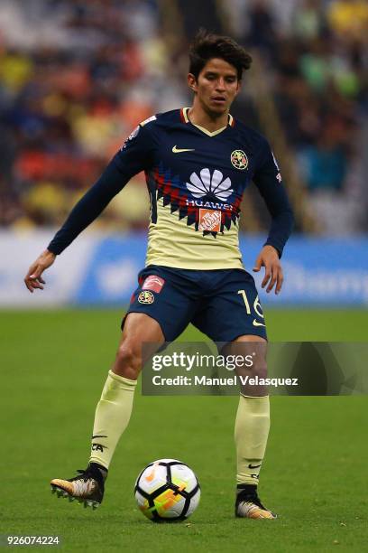 Emilio Orrantia of America controls the ball during the match between America and Saprissa as part of the round of 16th of the CONCACAF Champions...