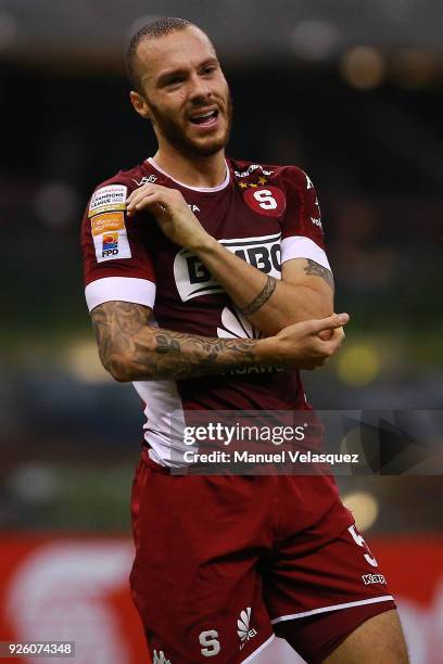 Henrique Moura of Saprissa reacts during the match between America and Saprissa as part of the round of 16th of the CONCACAF Champions League at...