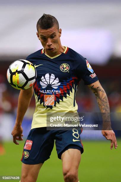 Matheus Uribe of America controls the ball during the match between America and Saprissa as part of the round of 16th of the CONCACAF Champions...