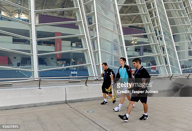 Andy Murray of Great Britain walks with members of his team after a training session on day one of the ATP 500 World Tour Valencia Open tennis...