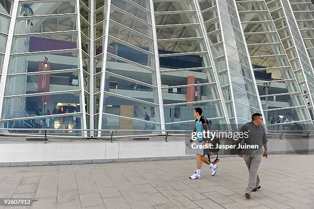 Andy Murray of Great Britain walks flanked by a security guard after a training session on day one of the ATP 500 World Tour Valencia Open tennis...