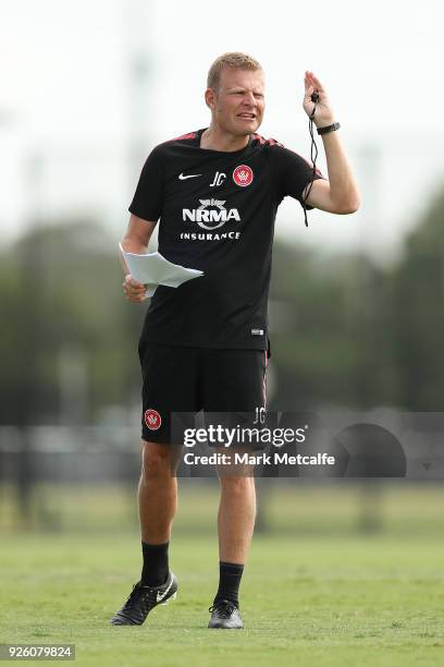 Wanderers coach Josep Gombau talks to players during a Western Sydney Wanderers A-League training session at Blacktown International Sportspark on...