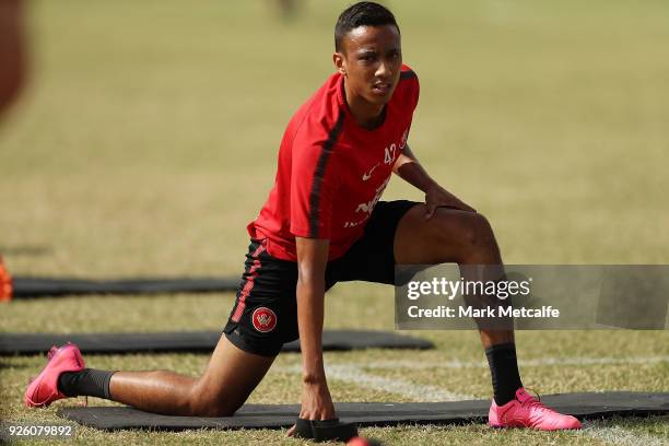 Keanu Baccus stretches during a Western Sydney Wanderers A-League training session at Blacktown International Sportspark on March 2, 2018 in Sydney,...