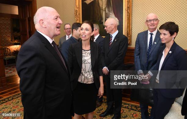 Australian Governor-General Sir Peter Cosgrove greets New Zealand Prime Minister Jacinda Ardern during Ardern's official visit to Admiralty House...