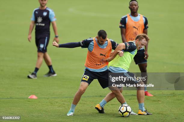 Rhyan Grant competes with Anthony Kalik during a Sydney FC A-League training session at Macquarie Uni on March 2, 2018 in Sydney, Australia.