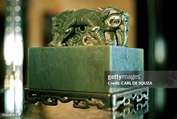 An Imperial Khotan-Green Jade Seal is pictured at Sothebys auction house in London, on November 2, 2009. The Seal is from the Qing Dynasty, Qianlong...
