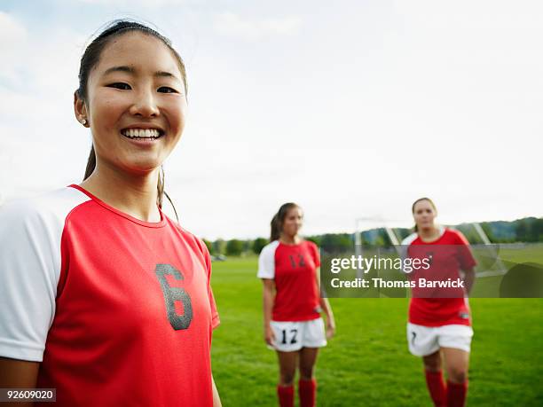 portrait female soccer player on field - banbossy stock pictures, royalty-free photos & images