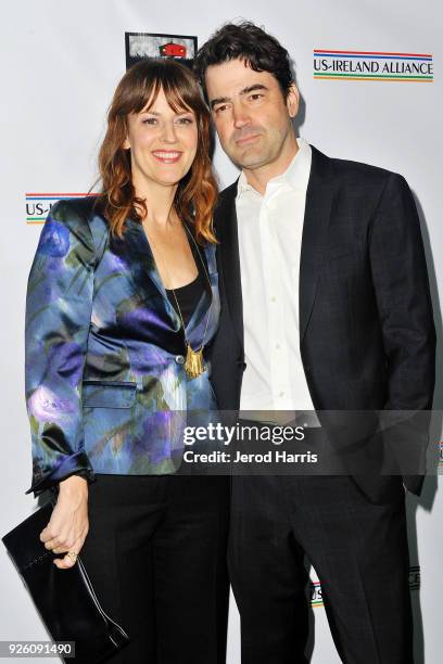 Actors Rosemarie DeWitt and Ron Livingston arrive at the 13th Annual Oscar Wilde Awards on March 1, 2018 in Santa Monica, California.